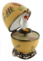 Oeufs musicaux de style Fabergé fabriqués en France Oeuf musical de style Fabergé en porcelaine de Limoges avec poule - Le beau Danube bleu