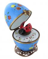 Oeufs musicaux de style Fabergé fabriqués en France Oeuf musical de style Fabergé en porcelaine avec coccinelle - Roméo et Juliette (Nino Rota)