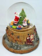 Boules à neige musicales de Noël disponibles sur commande (nous contacter) Boule à neige musicale de Noël : boule à neige avec Père Noël et enfant décorant un sapin de Noël