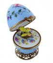 Oeuf musical de style Fabergé fabriqué en France: oeuf musical en porcelaine avec agneau