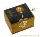 Boîte à musique à manivelle en bois avec image d'un portrait de Jean-Sébastien Bach
