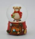 Boule à neige musicale de Noël avec globe en verre, neige et ours en peluche tenant un cadeau de Noël