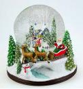 Boule à neige musicale de Noël avec globe en verre et scène de village et de traineau du Père Noël