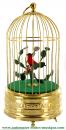 Oiseau chanteur mécanique : 1 oiseau chanteur automate dans une cage dorée