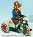 Jouet mécanique en métal, tôle et fer blanc : jouet mécanique singe sur tricycle