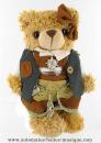 Ours en peluche musical : ours fille en costume folklorique