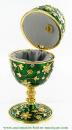 Oeuf musical de style Fabergé : oeuf musical vert en métal avec dorures