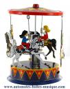 Jouet mécanique en métal, tôle et fer blanc agrafé : jouet mécanique "Carrousel avec chevaux"