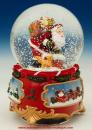 Boule à neige musicale de Noël : boule à neige musicale avec Père Noël sortant d'une cheminée