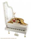 Instrument de musique miniature : piano à queue en résine avec ballerine dansante