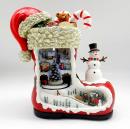 Automate musical de Noël : automate musical en forme de botte avec train tournant et bonhomme de neige